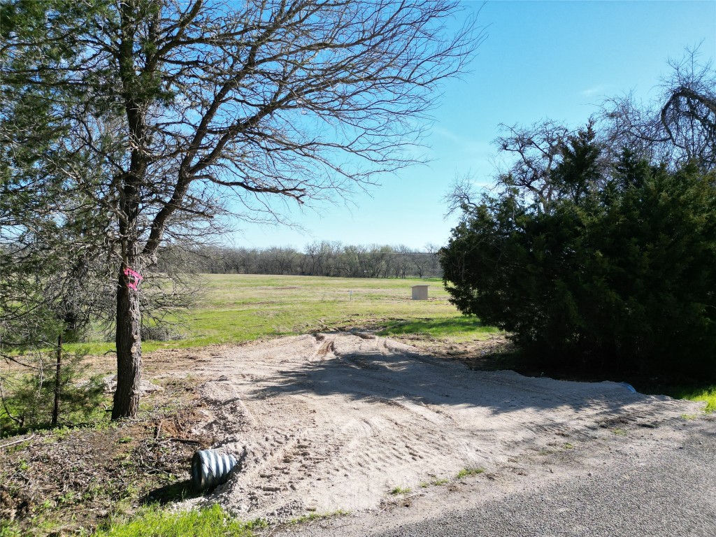 a view of lake with mountain in background