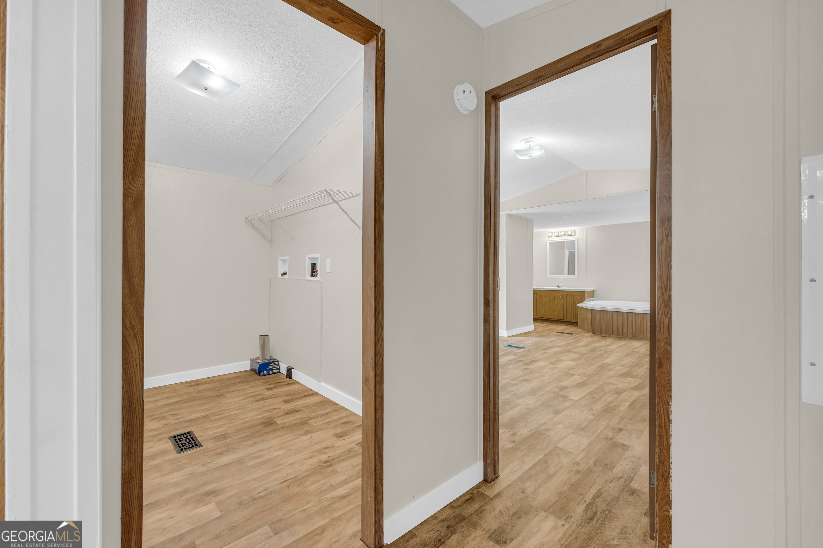 162 Stillwater Road Lavonia, GA 30553 - Photo 25 of 45 a view of a bathroom from a hallway