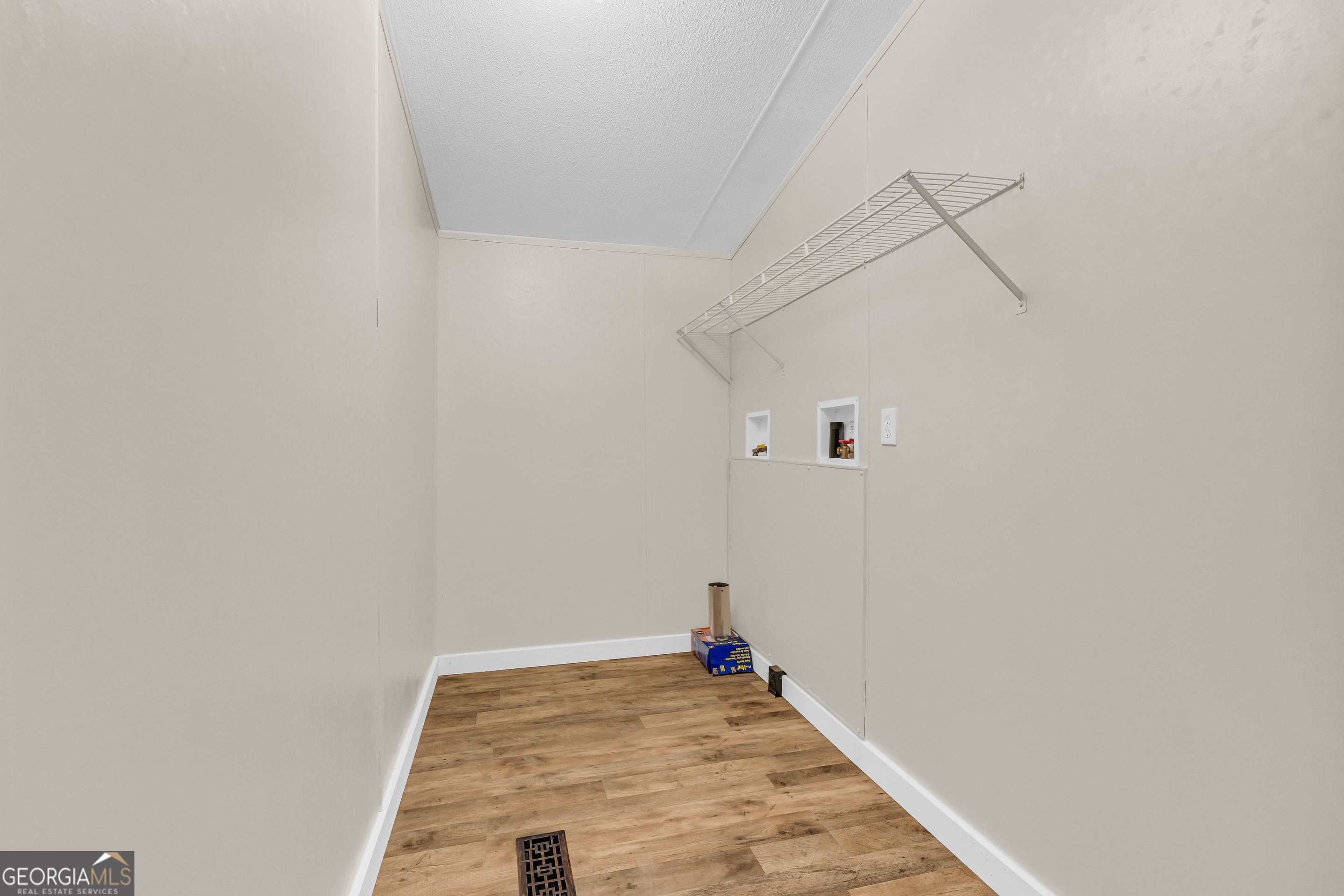 162 Stillwater Road Lavonia, GA 30553 - Photo 26 of 45 a view of a room with wooden floor