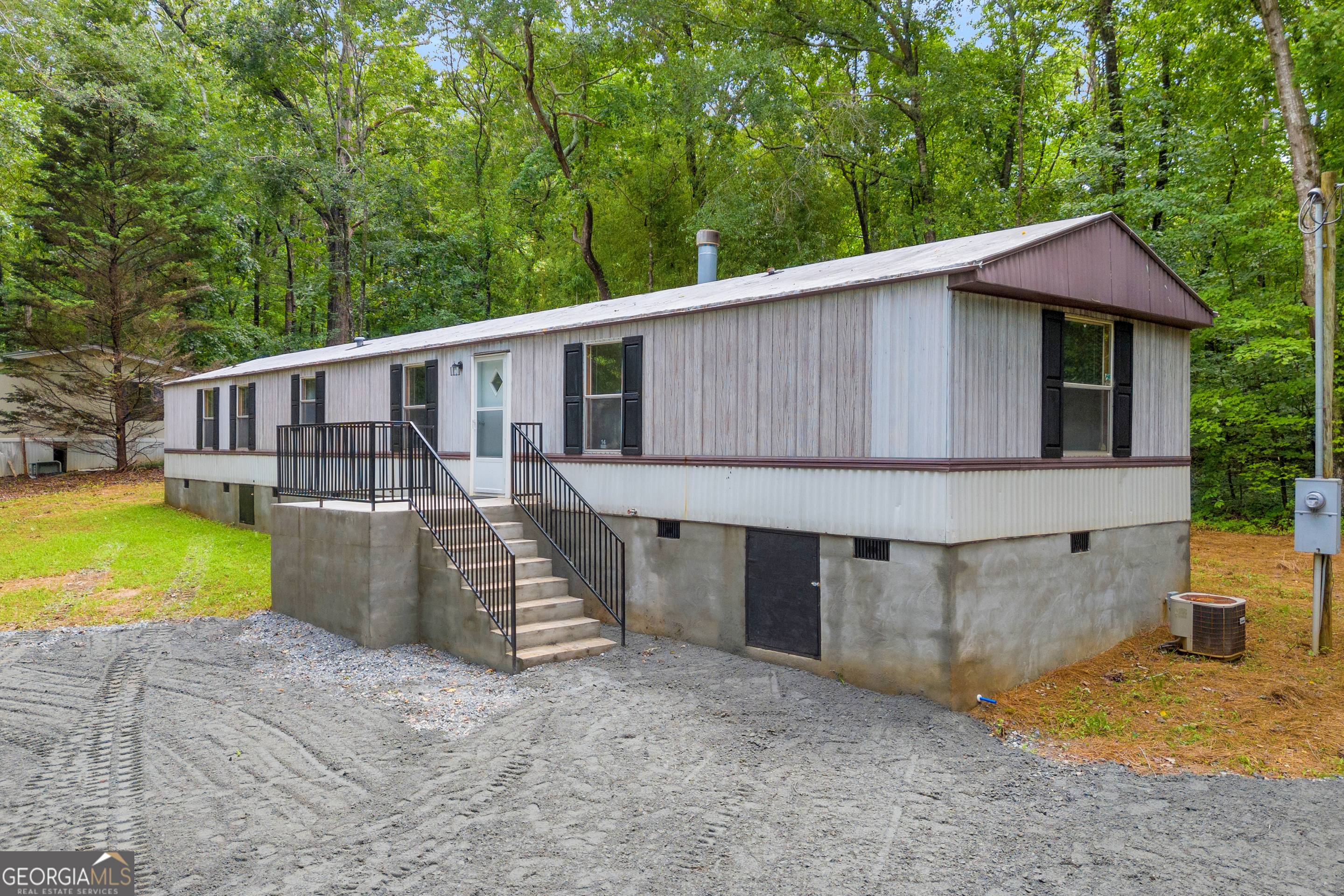 162 Stillwater Road Lavonia, GA 30553 - Photo 4 of 45 a view of a house with pool and chairs