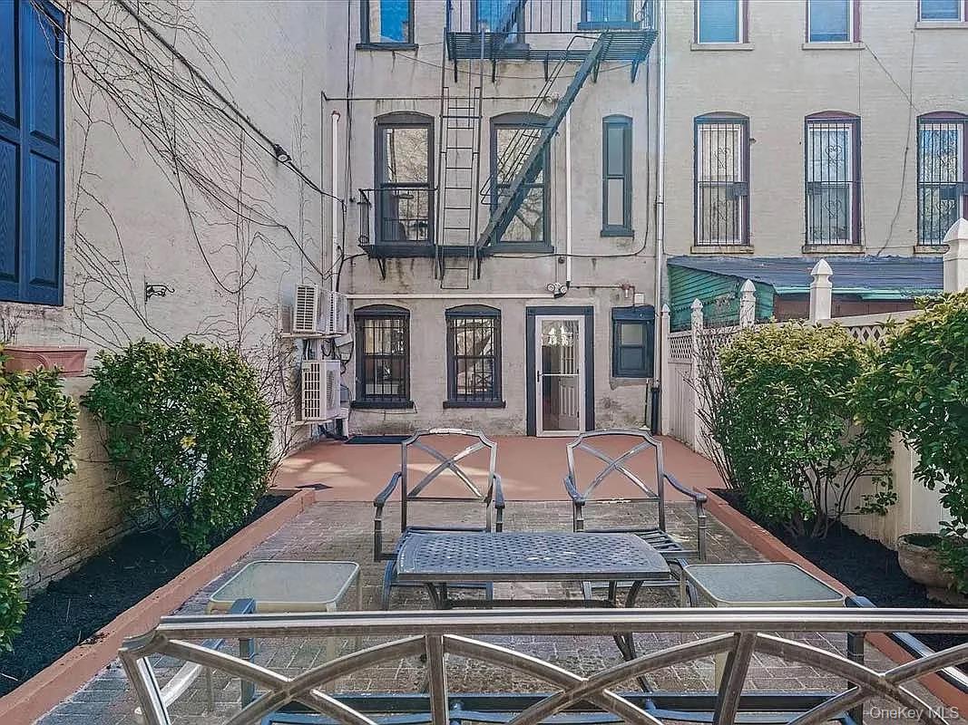 643 Decatur Street, Unit 1 Brooklyn, NY 11233 - Photo 24 of 27 a front view of house with yard