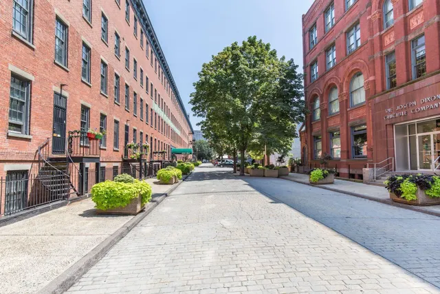 a view of a building with a street