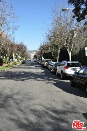 a cars parked on the side of the street