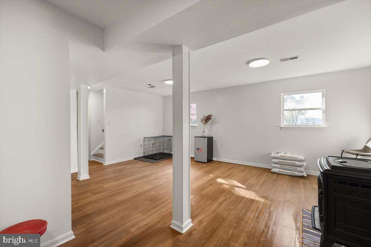 247 Arrowood Road Linden, VA 22642 - Photo 16 of 23 a view of livingroom with hardwood floor and a ceiling fan