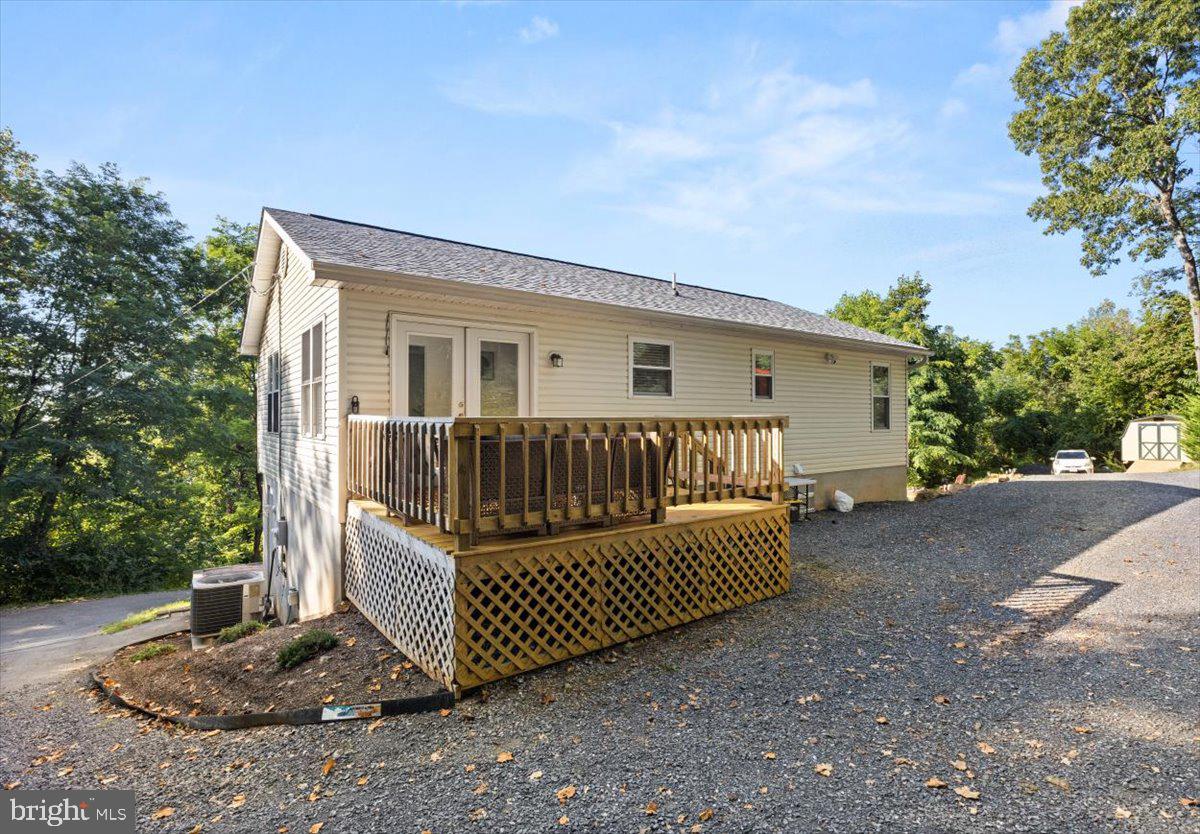 247 Arrowood Road Linden, VA 22642 - Photo 19 of 23 a view of a porch with a small yard