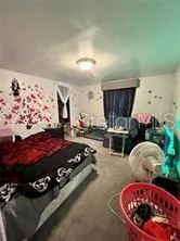 a gym room with furniture