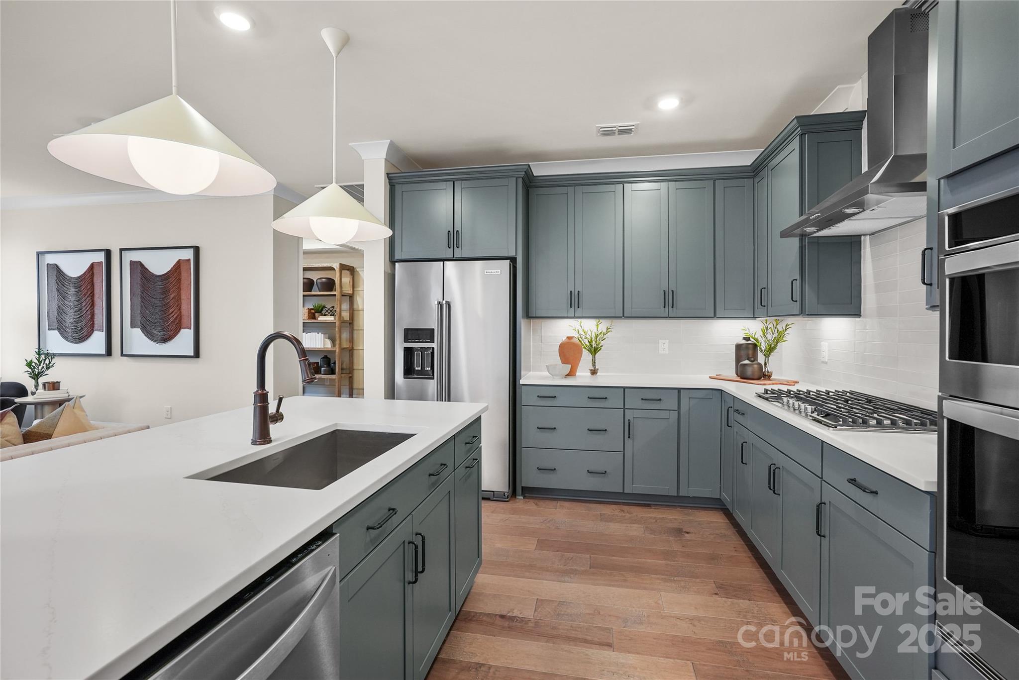 906 Kinship Drive Lancaster, SC 29720 - Photo 13 of 13 a kitchen with stainless steel appliances granite countertop a sink stove and refrigerator
