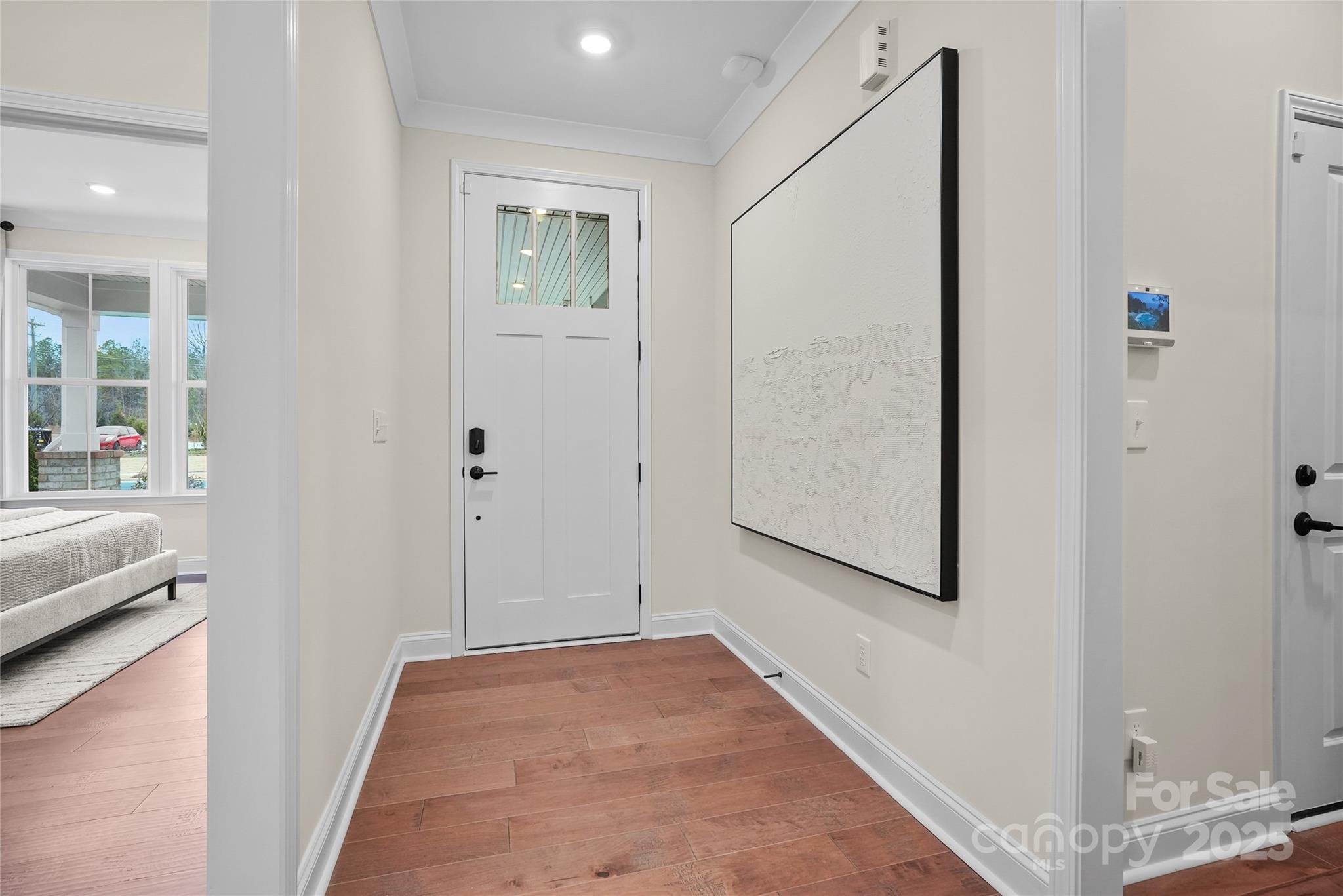 906 Kinship Drive Lancaster, SC 29720 - Photo 2 of 13 a view of a hallway with bathroom and shower