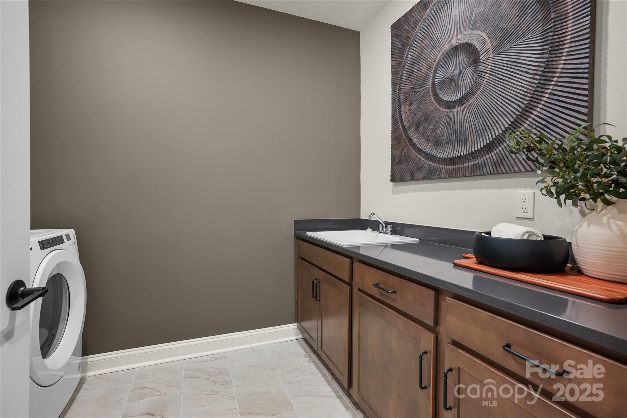 906 Kinship Drive Lancaster, SC 29720 - Photo 5 of 13 a bathroom with a sink and a mirror