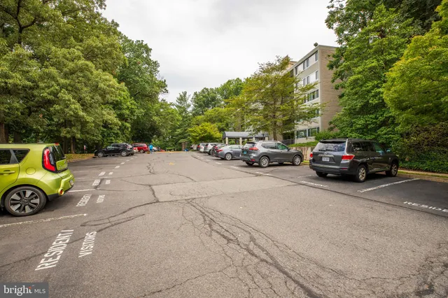 a view of a cars parked in front of a house