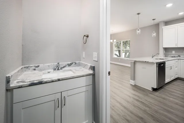 a view of a bathroom with a glass door
