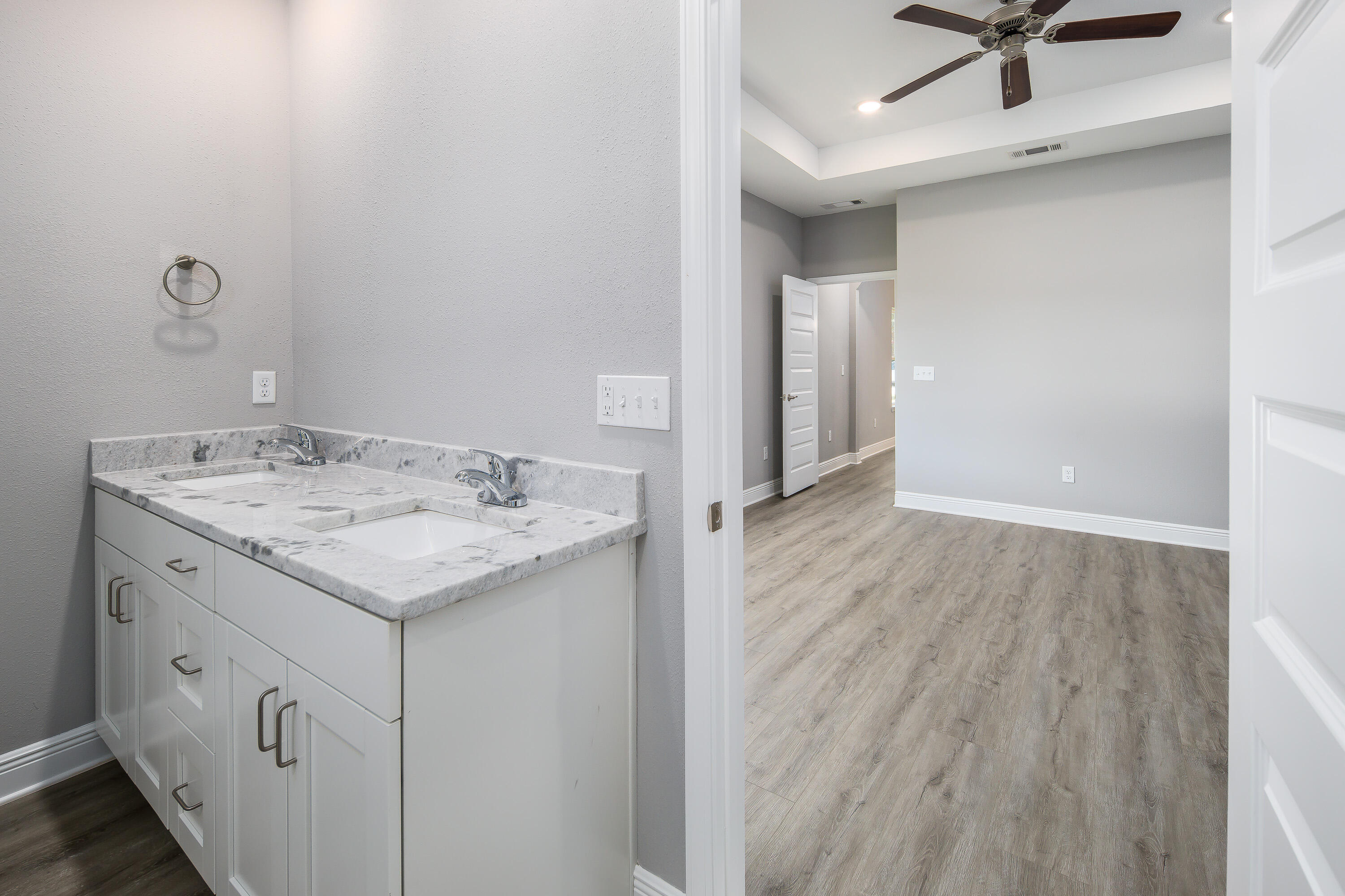 997 Skylark Road Mary Esther, FL 32569 - Photo 24 of 41 a bathroom with a granite countertop sink toilet and shower