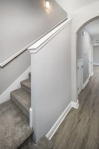a view of a hallway with staircase