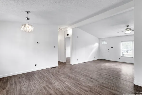 a view of a livingroom with wooden floor
