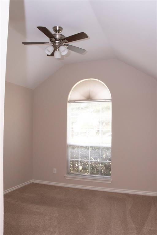 10702 Huntington Road Frisco, TX 75035 - Photo 13 of 23 an empty room with a window