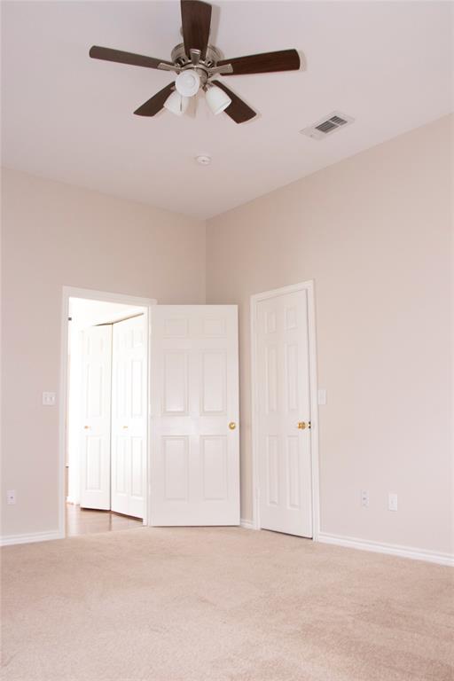 10702 Huntington Road Frisco, TX 75035 - Photo 23 of 23 an empty room with closet and fan