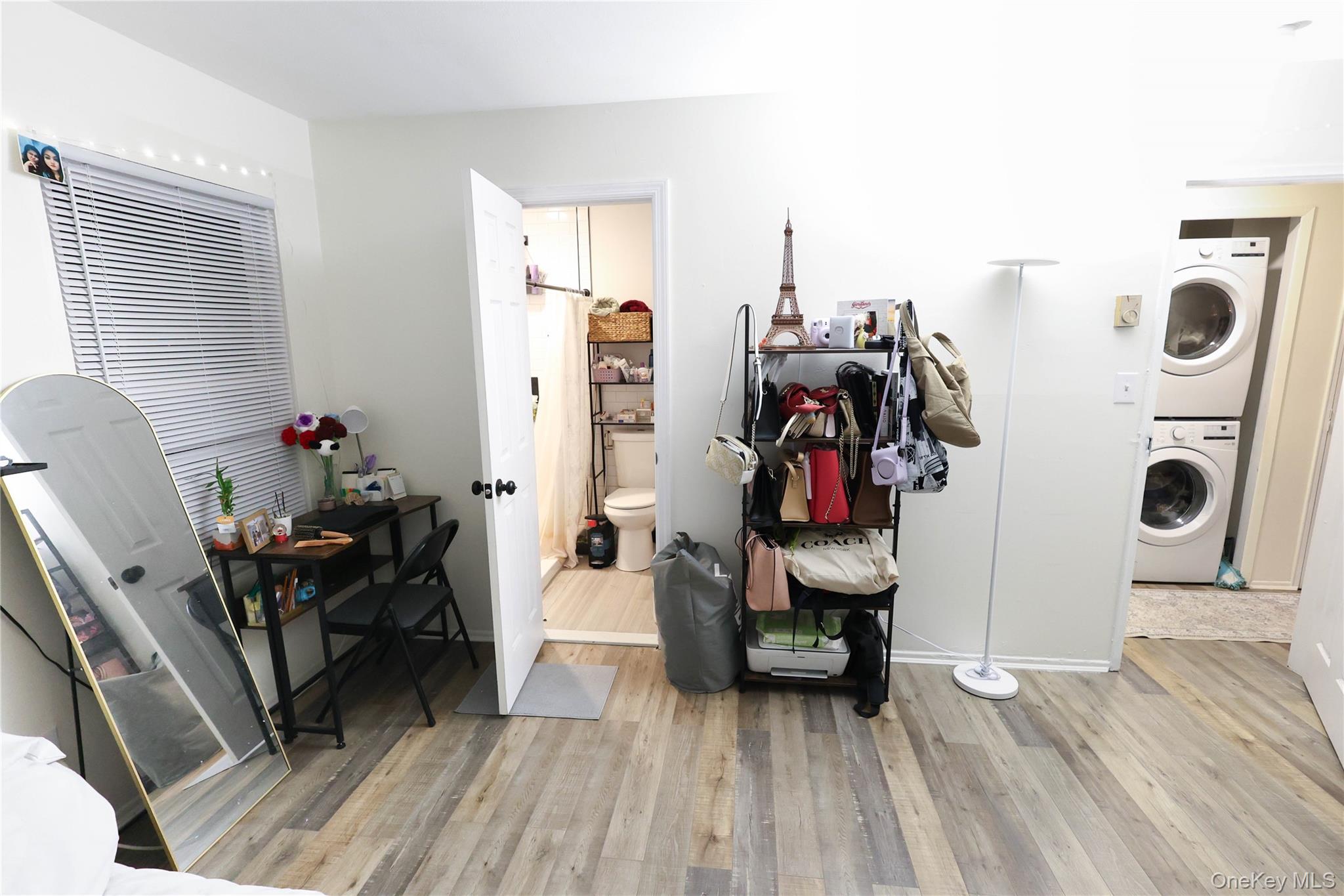 3 Saratoga Court, Unit B Ridge, NY 11961 - Photo 14 of 15 a view of a room with gym equipment