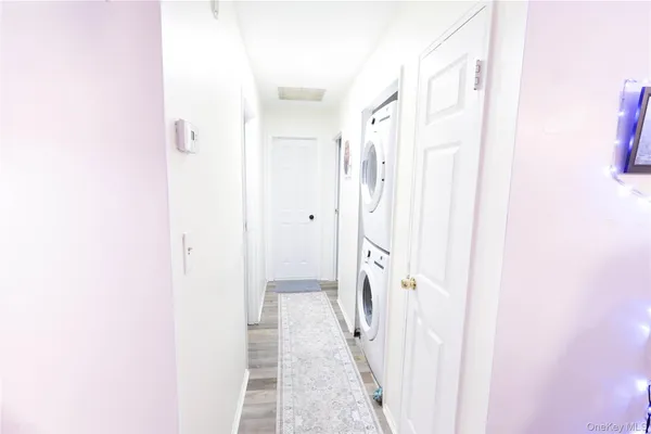 a bathroom with a shower and a sink