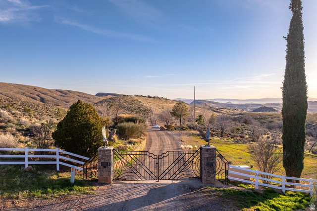 779 South Silver Road Leeds, UT 84746 - Photo 77 of 80 View of street featuring a mountain view, a view of rural / pastoral area, and a gate