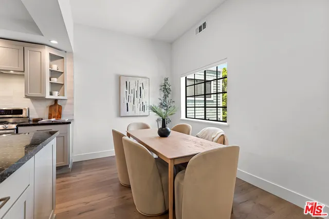 a kitchen with sink and microwave
