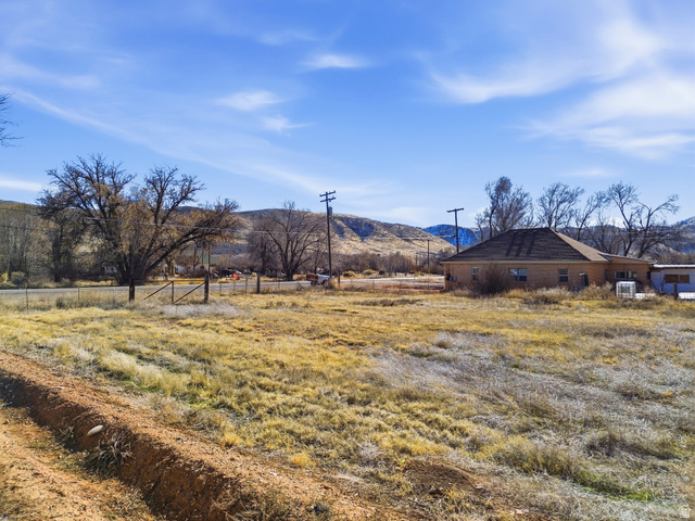 66 South State Street Sigurd, UT 84657 - Photo 13 of 13 View of yard featuring a rural view and a mountain view