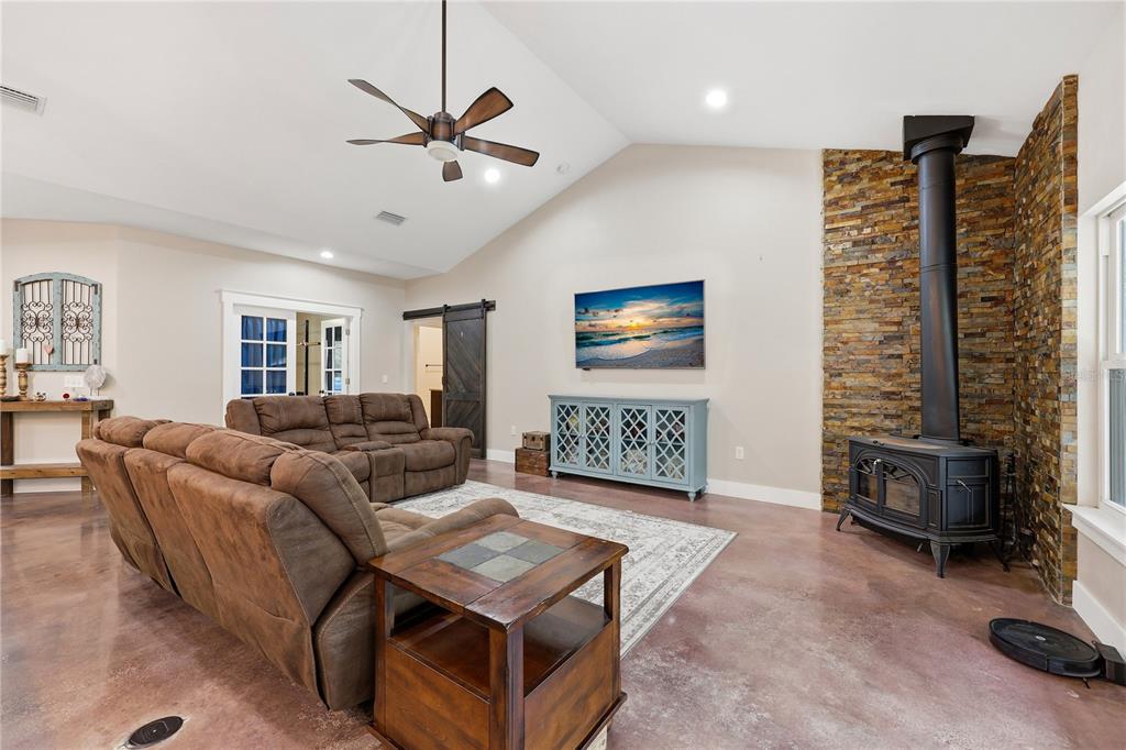 357 Southwest Conestoga Way Fort White, FL 32038 - Photo 17 of 44 a living room with furniture and a window