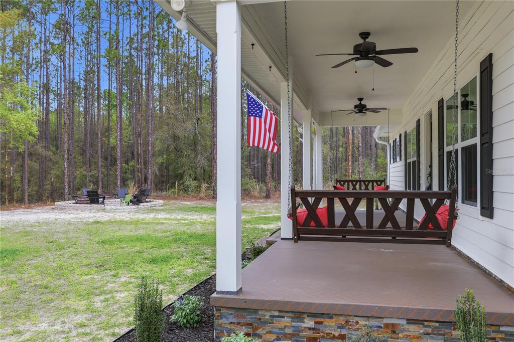 357 Southwest Conestoga Way Fort White, FL 32038 - Photo 6 of 44 a view of swimming pool with seating space
