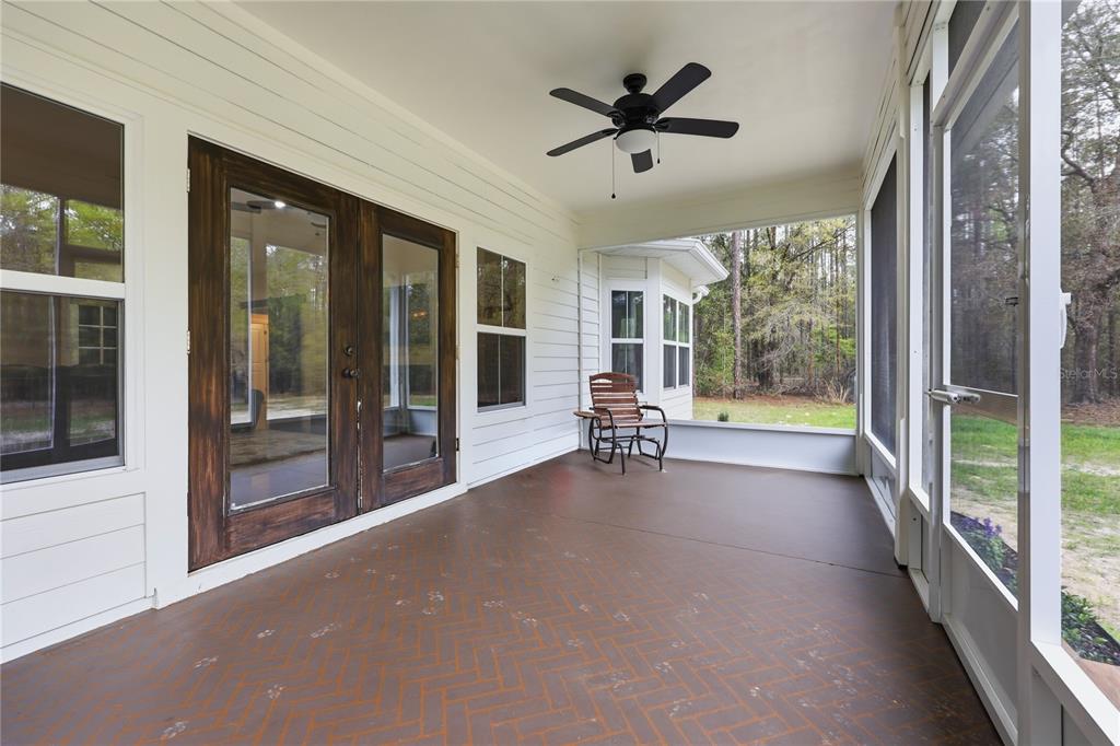 357 Southwest Conestoga Way Fort White, FL 32038 - Photo 7 of 44 a view of a livingroom with wooden floor and furniture