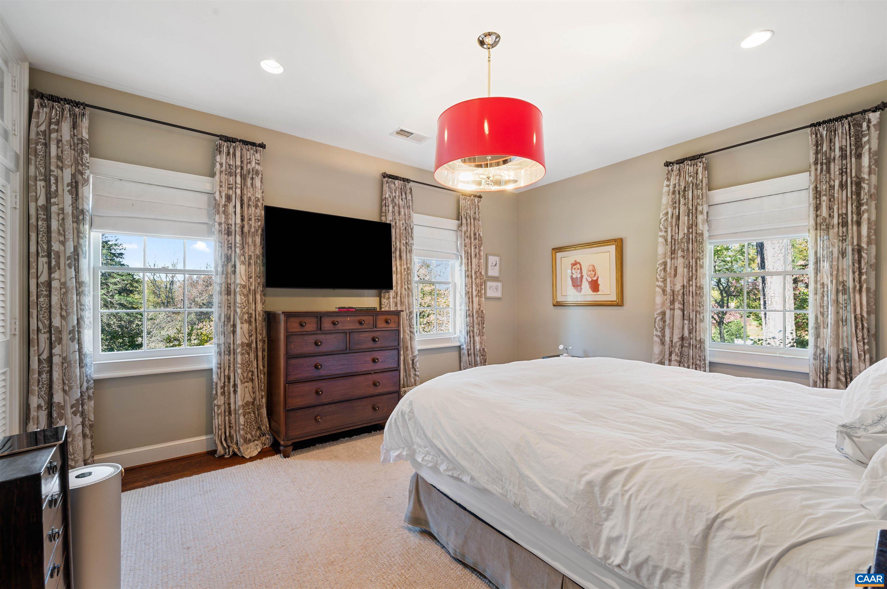 31 Old Farm Road Charlottesville, VA 22903 - Photo 43 of 62 a bedroom with a bed and a flat screen tv