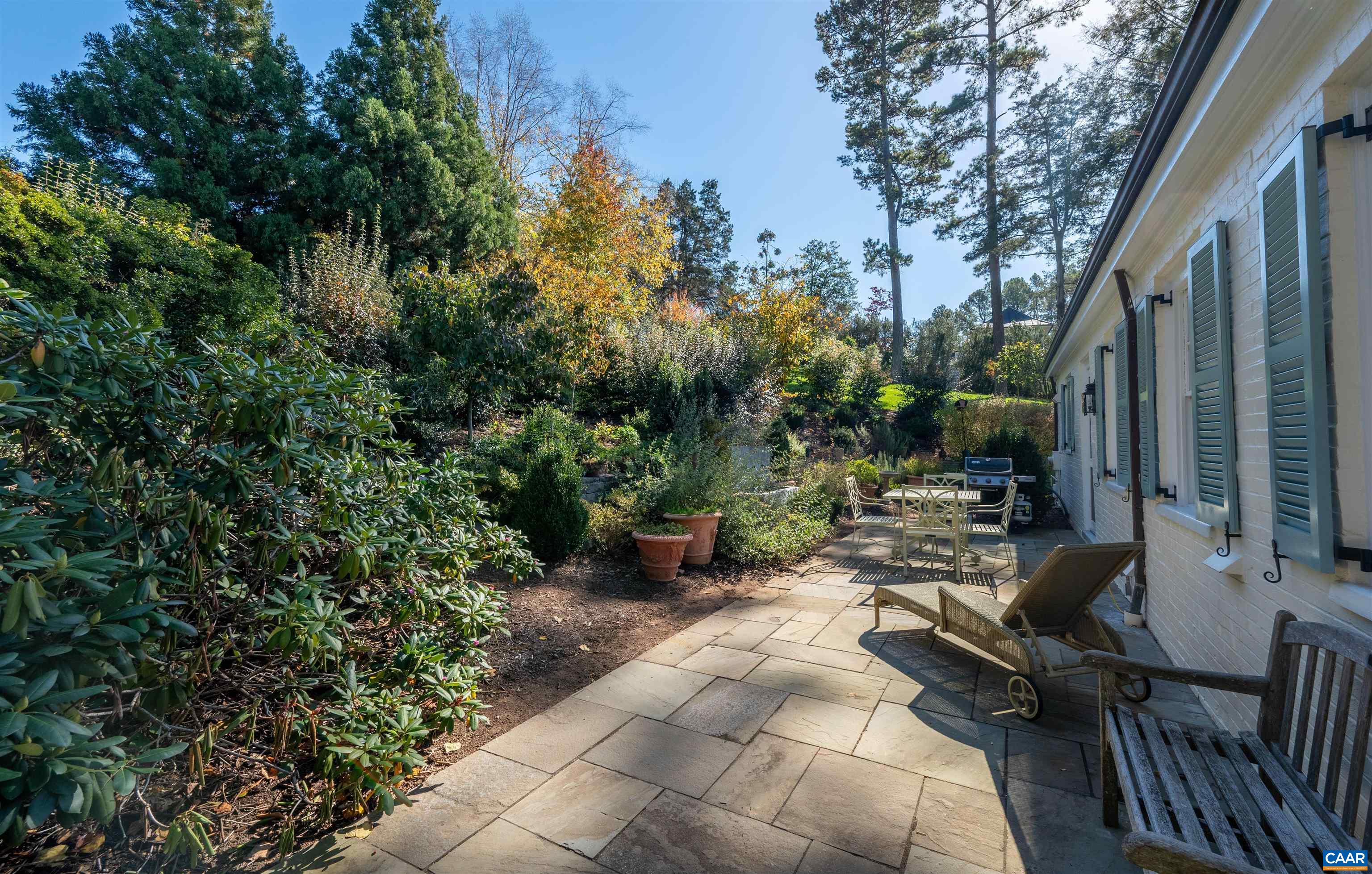 31 Old Farm Road Charlottesville, VA 22903 - Photo 51 of 62 a view of a backyard with sitting area and garden