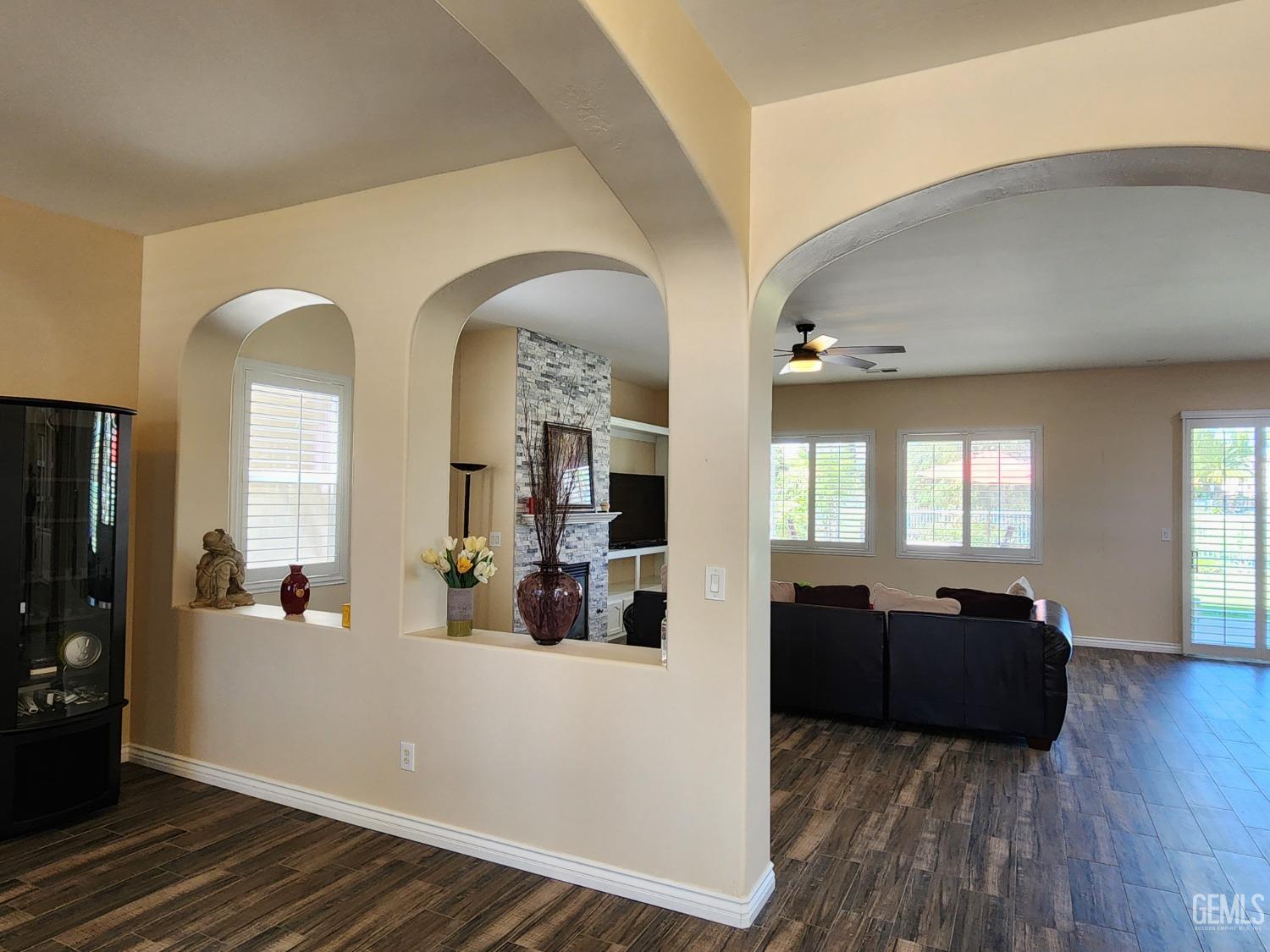 Undisclosed Address Bakersfield, CA 93312 - Photo 12 of 44 a view of living room with furniture and wooden floor