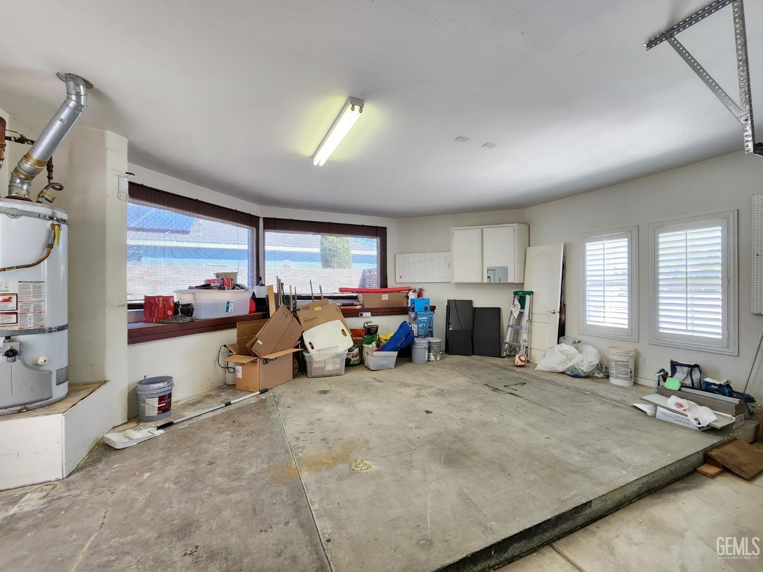 Undisclosed Address Bakersfield, CA 93312 - Photo 38 of 44 a bed room with furniture and a window