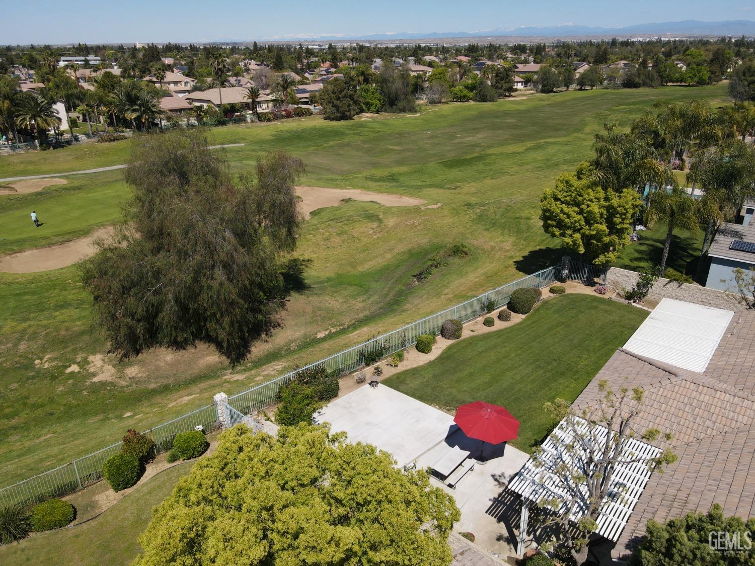 Undisclosed Address Bakersfield, CA 93312 - Photo 41 of 44 a view of a lake with a yard