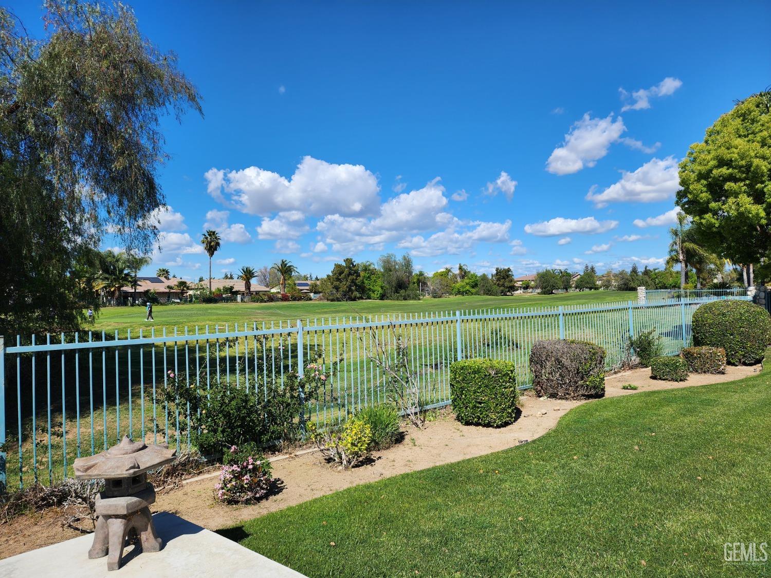 Undisclosed Address Bakersfield, CA 93312 - Photo 6 of 44 a garden view with a lake view