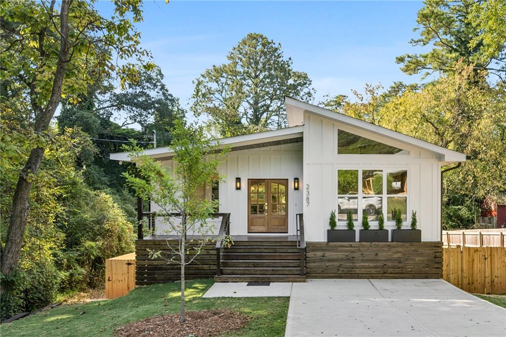 front view of a house with a yard