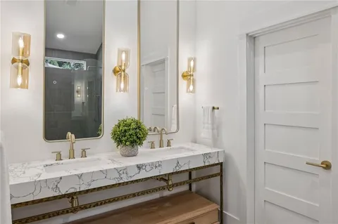 a bathroom with a bathtub and a shower