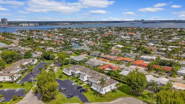 an aerial view of a house with a garden