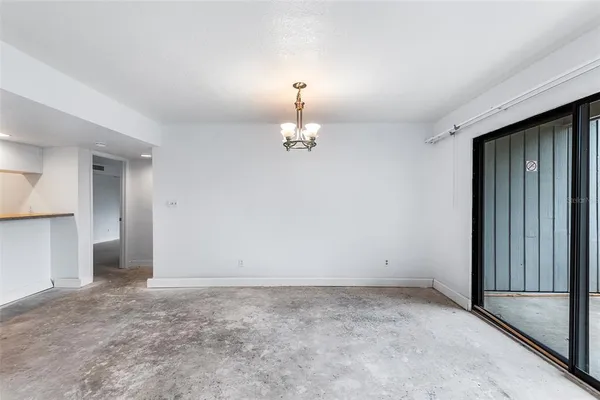 a view of empty room with windows