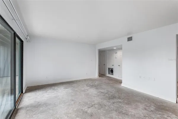 an empty room with an entryway