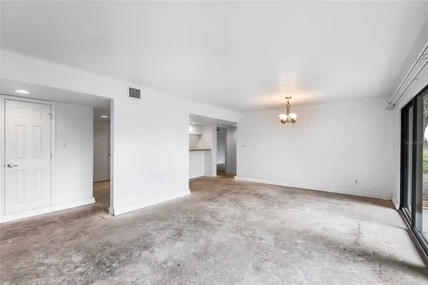 an empty room with a natural light