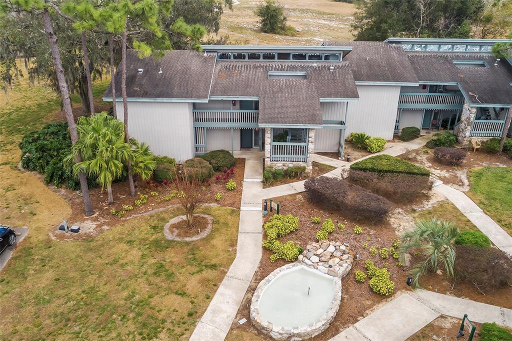 2070 Corner Lake, Unit AB Haines City, FL 33844 - Photo 30 of 31 a view of a house with backyard