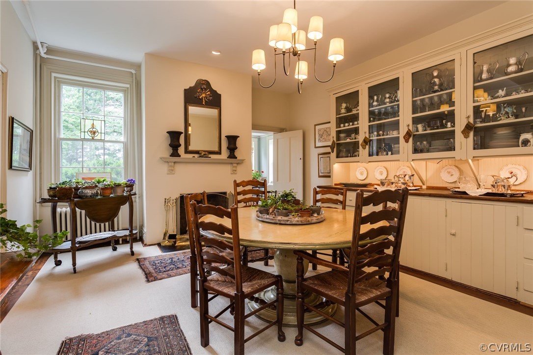 7285 Plank Road Afton, VA 22920 - Photo 11 of 50 a view of a dining room with furniture and a chandelier