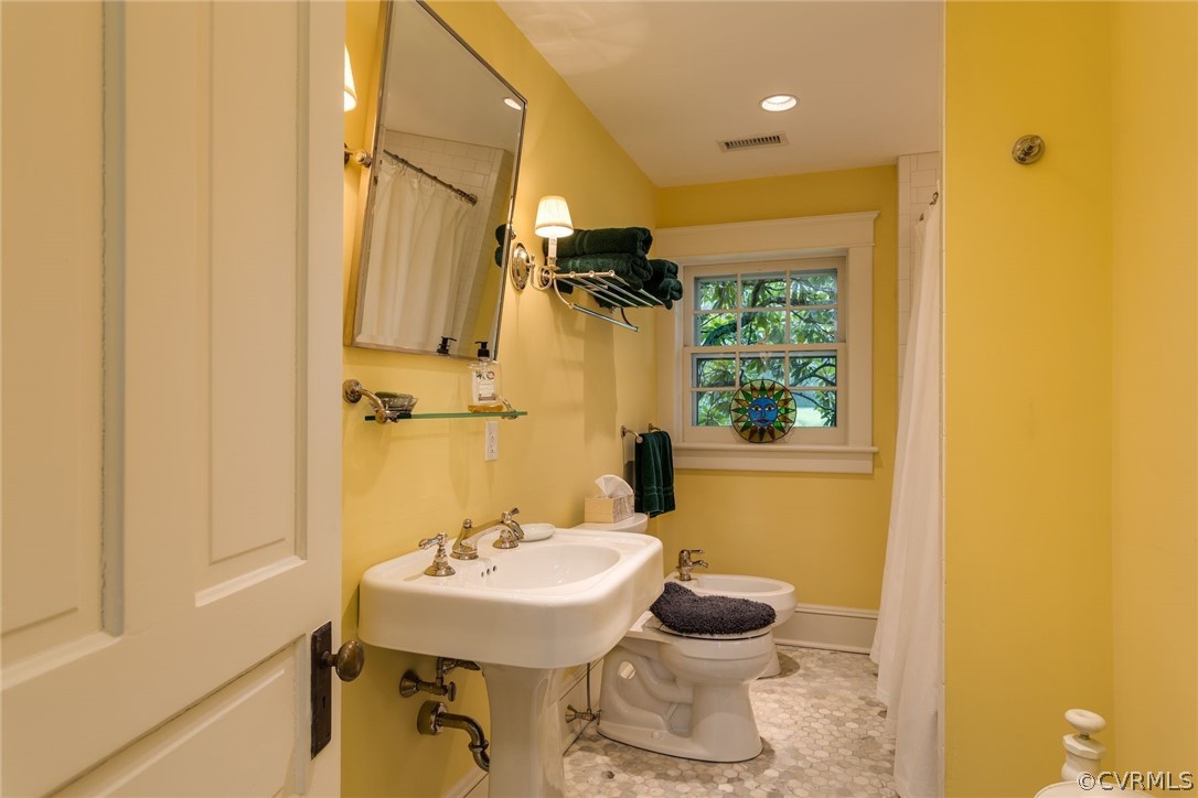 7285 Plank Road Afton, VA 22920 - Photo 19 of 50 a bathroom with a sink toilet and shower