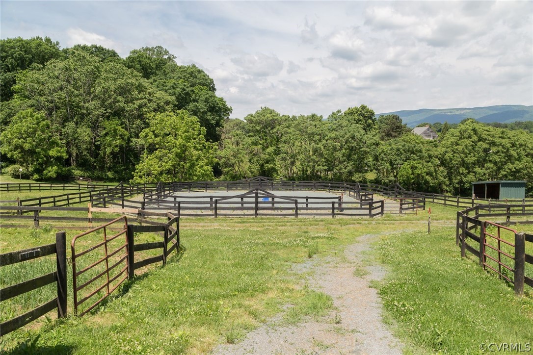 7285 Plank Road Afton, VA 22920 - Photo 44 of 50 a view of a swimming pool with a bench and trees in the background