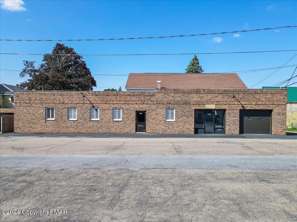 827 West 2nd Street Hazleton, PA 18201 - Photo 1 of 35 a front view of a house with a yard