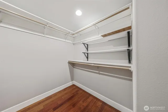 a view of an empty walk in closet