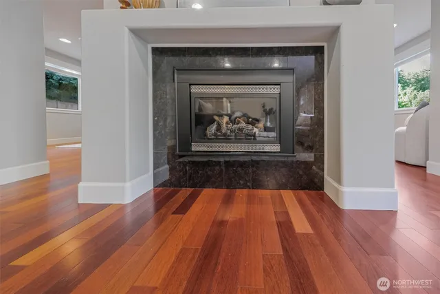 a view of a living room with a wooden floor