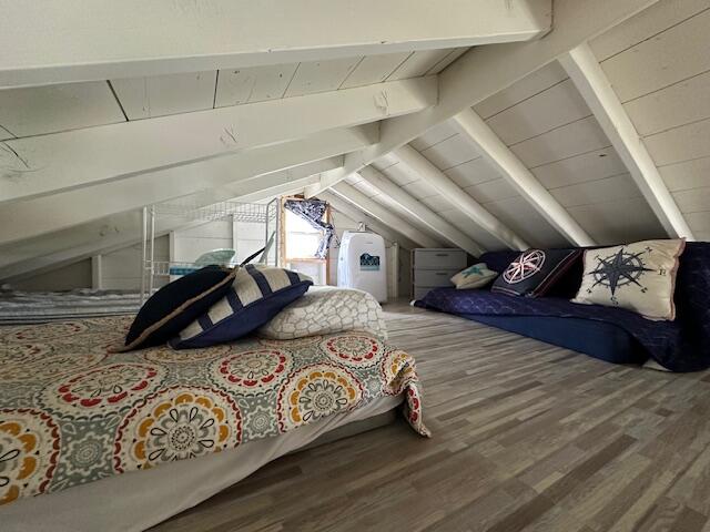 242 Old Wharf Road, Unit F7 Dennis Port, MA 02639 - Photo 20 of 48 a bedroom with a bed that has a blanket and pillows