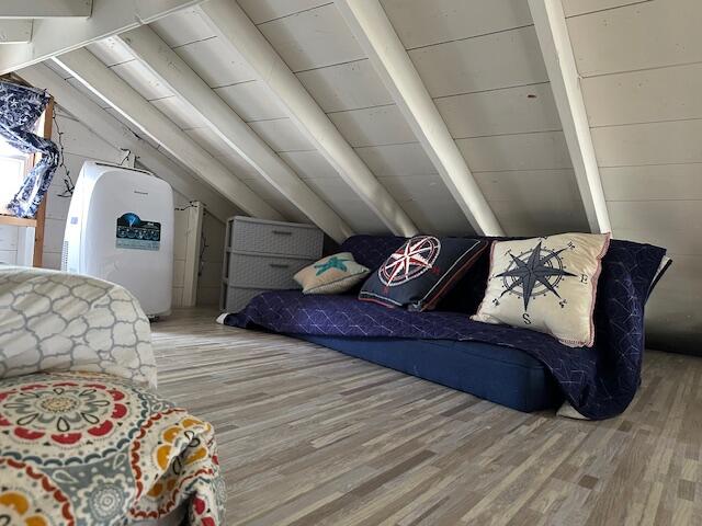 242 Old Wharf Road, Unit F7 Dennis Port, MA 02639 - Photo 22 of 48 a bedroom with a bed and a couch