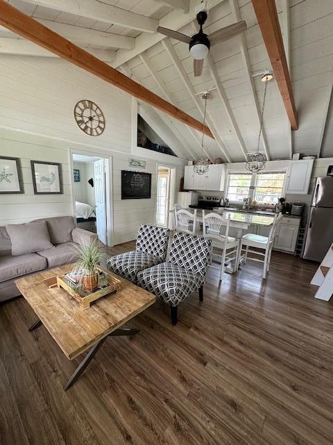 242 Old Wharf Road, Unit F7 Dennis Port, MA 02639 - Photo 23 of 48 a living room with lots of furniture and wooden floor